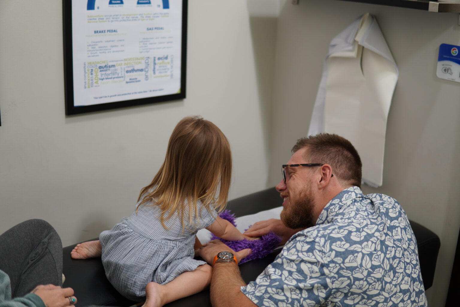 Relaxed child receiving chiropractic care in Wall Township NJ